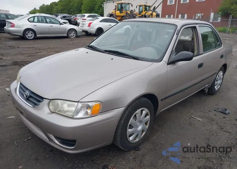 2001 Toyota Corolla Ce z USA, uszkodzony, nr VIN 2T1BR12EX1C416688
